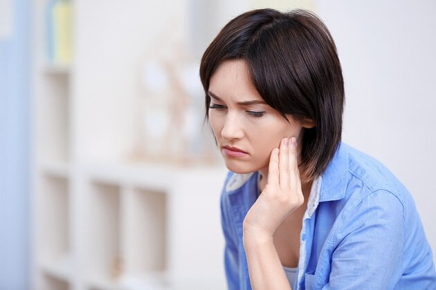 Woman with TMJ pain