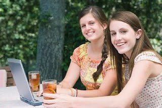 Teens with laptop