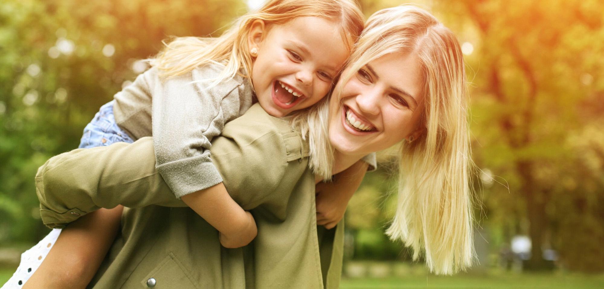 Woman and Daughter smiling